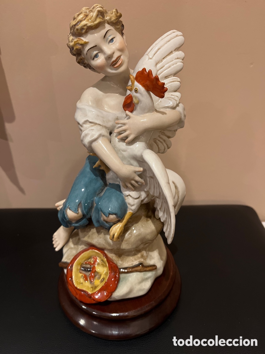 Antig&uuml;edades: Figura de porcelana, joven con gallo