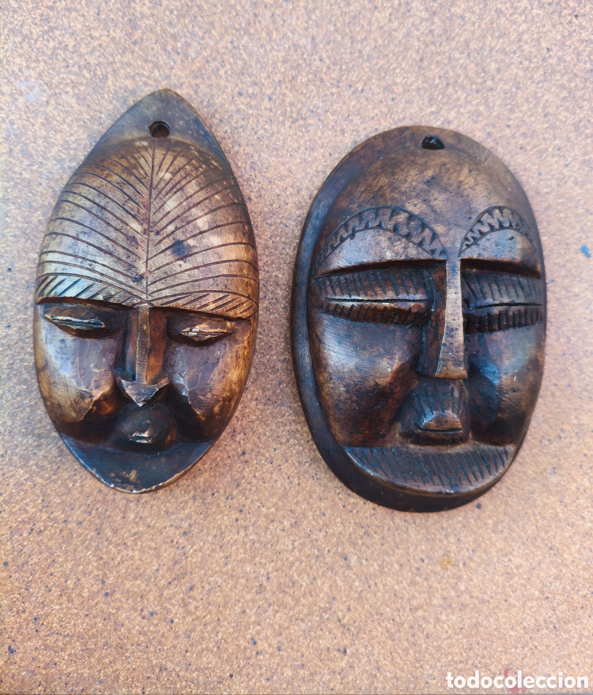 Antig&uuml;edades: m&aacute;scaras africanas de piedra tallada a mano