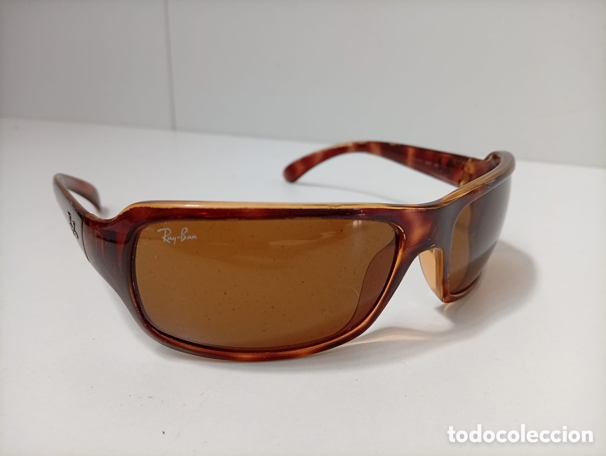 Antig&uuml;edades: . GAFAS DE SOL RAY BAN MARRONES CON ESTUCHE ORIGINAL.