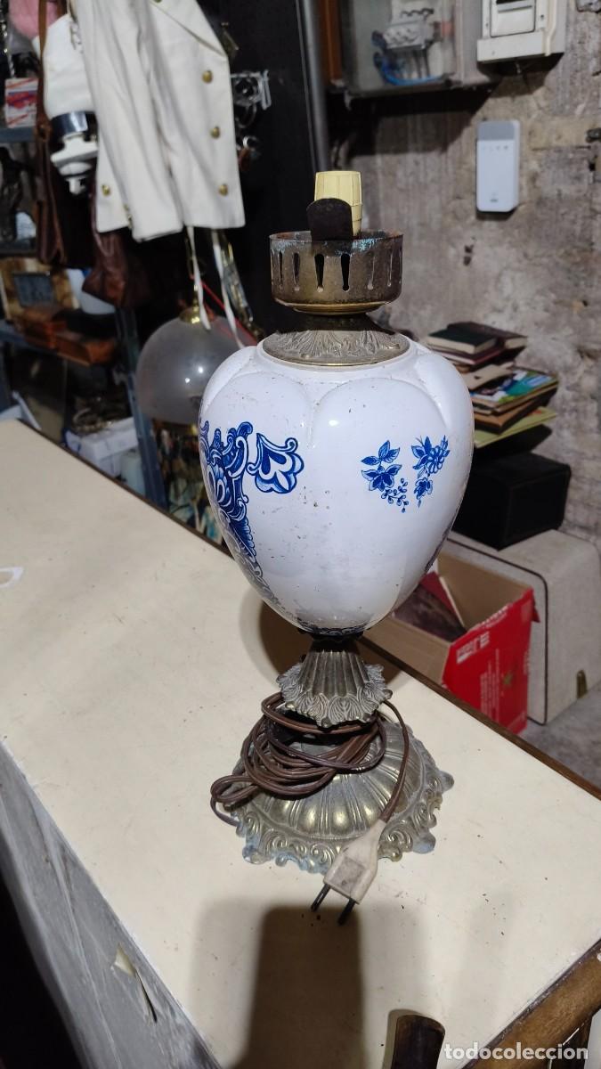 Antig&uuml;edades: Lampe a p&eacute;trole r&eacute;servoir boule bronze et laiton 1900