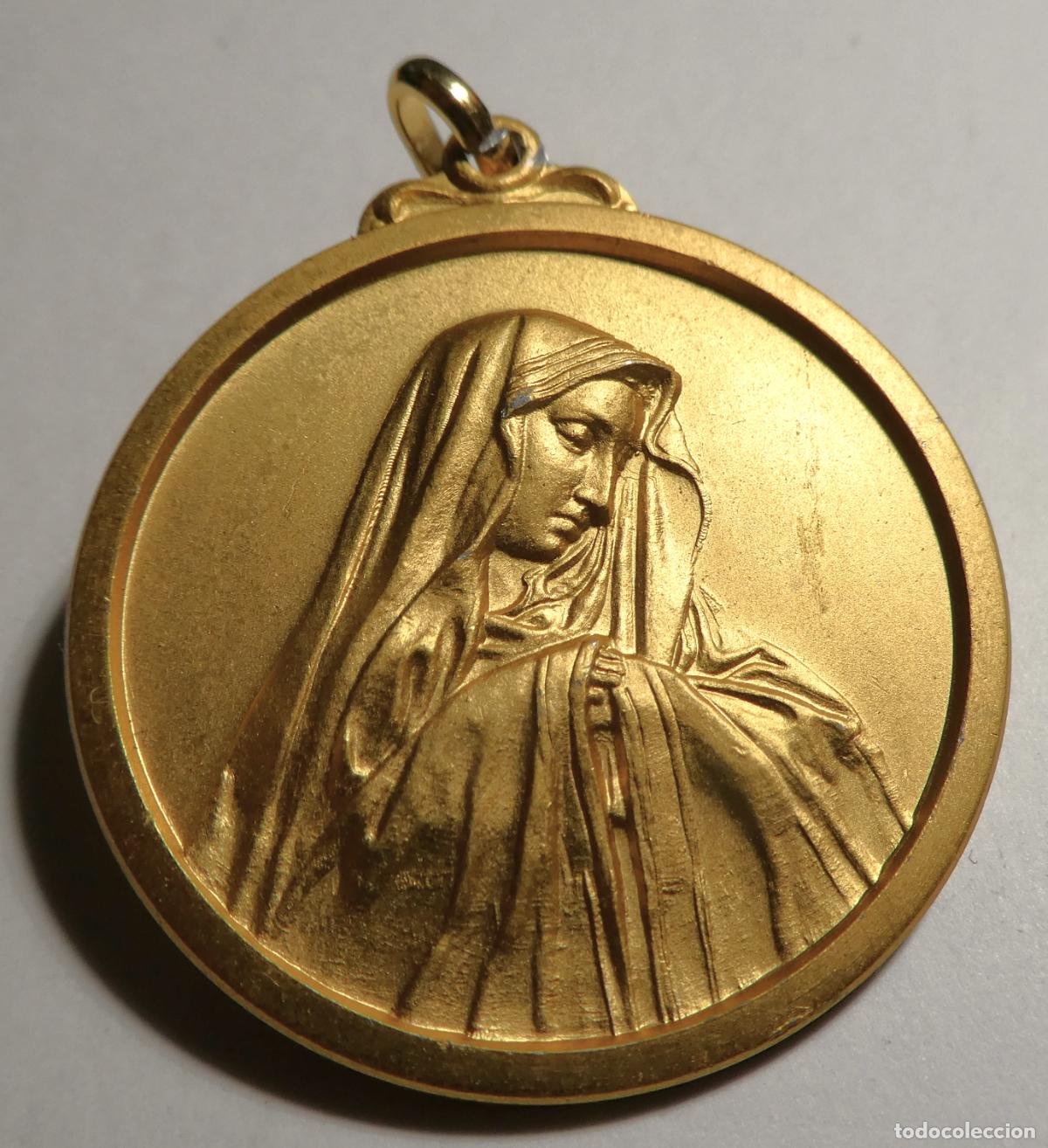 Antig&uuml;edades: Medalla de la Virgen de la Dolorosa.