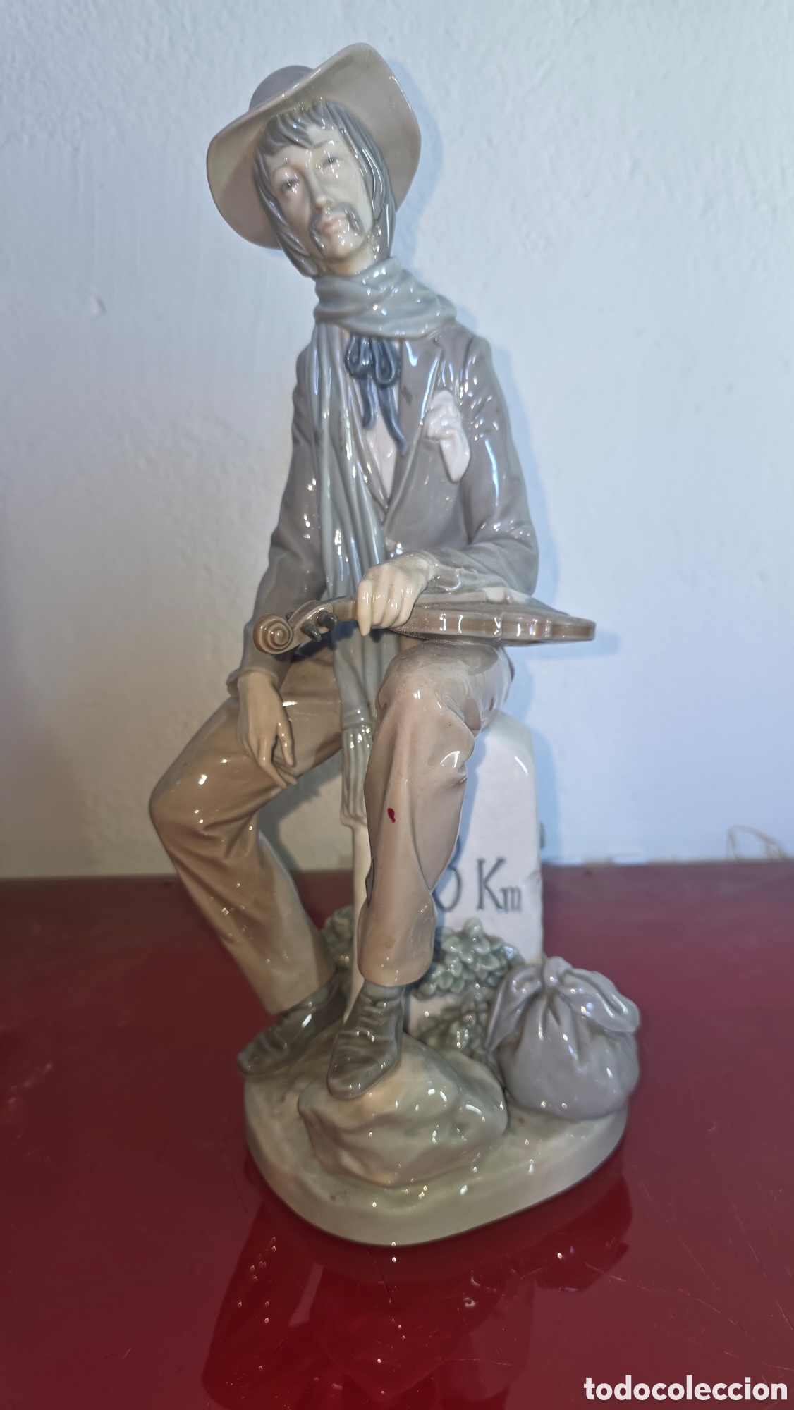 Antig&uuml;edades: Figura porcelana lladro violinista en el camino
