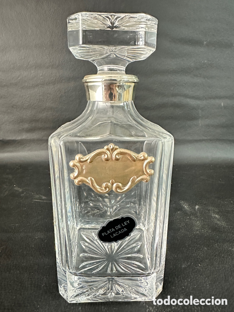 Antig&uuml;edades: Licorera de cristal grueso y plata