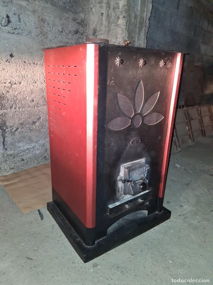 Antig&uuml;edades: Estufa chimenea de biomasa marca Redondo pellet u orujillo hueso de aceituna
