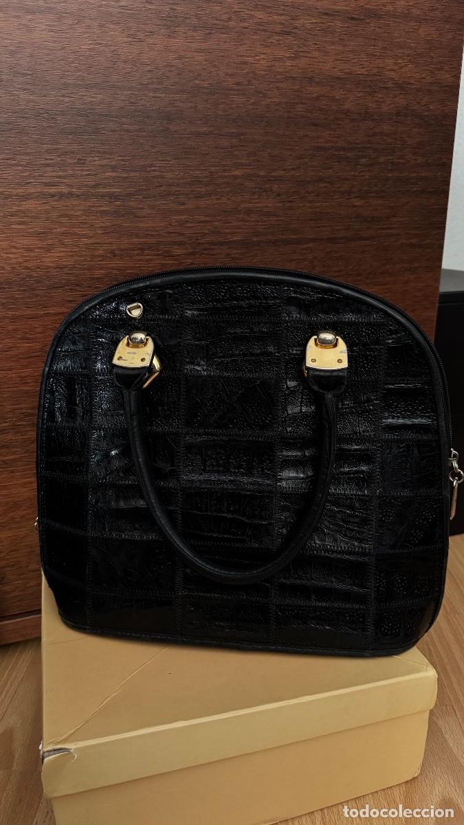 Antig&uuml;edades: Bolso del piel de cocodrilo