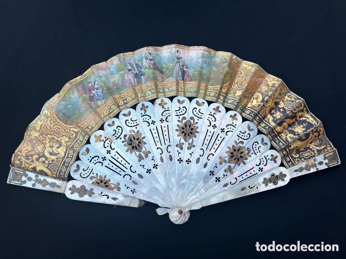 Antig&uuml;edades: Antiguo abanico de n&aacute;car y papel pintado.