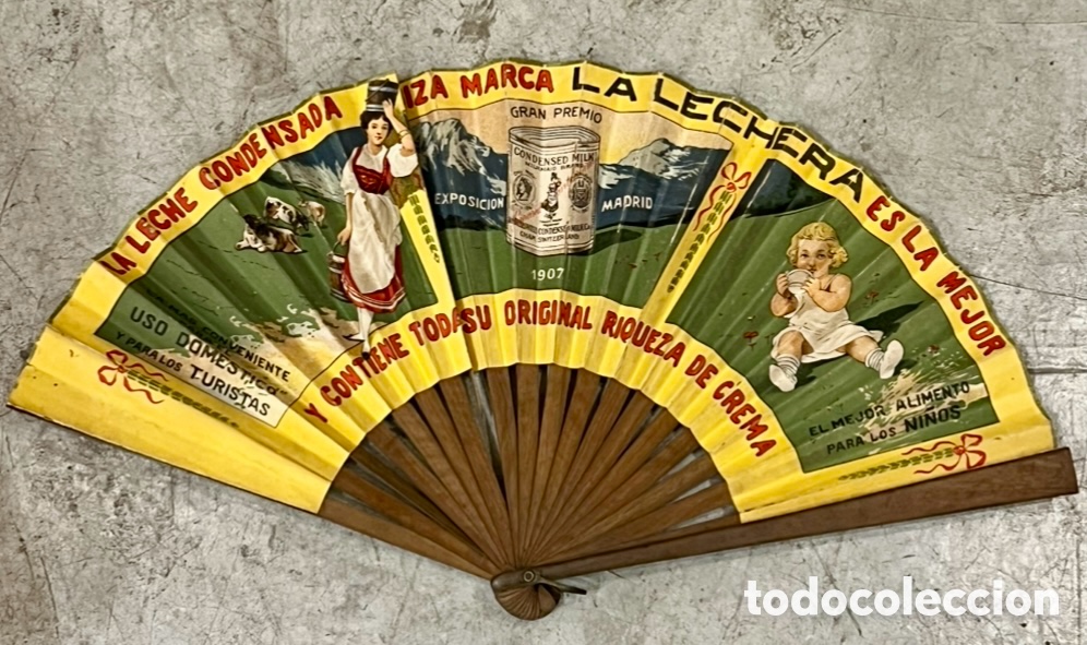 Antig&uuml;edades: Abanico. Publicidad LA LECHERA. Exposici&oacute;n Madrid. Papel y madera. 1907.