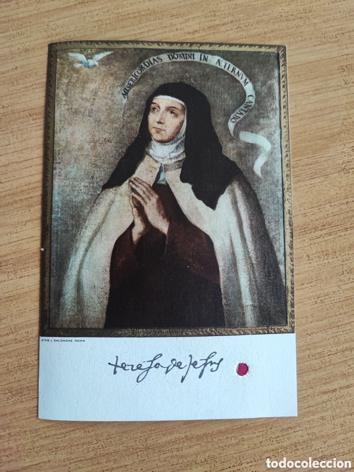 Antig&uuml;edades: Estampa con reliquia de Santa Teresa de Jes&uacute;s.