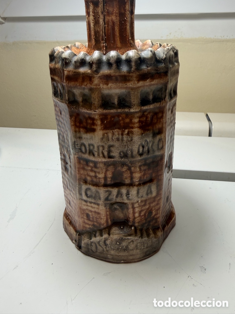 Antig&uuml;edades: Botella antigua cer&aacute;mica Torre del Oro Cazalla