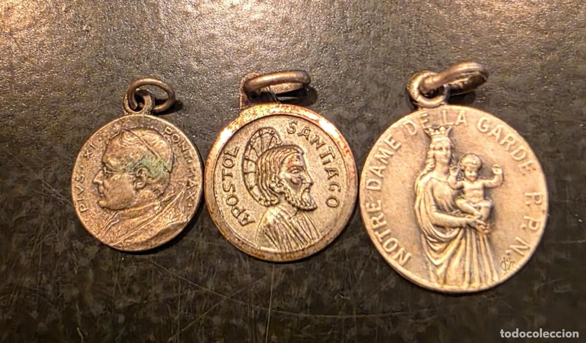Antig&uuml;edades: Lote de 3 Medallas Religiosas Vintage &ndash; Papa P&iacute;o X, Ap&oacute;stol Santiago y Notre Dame de la Garde