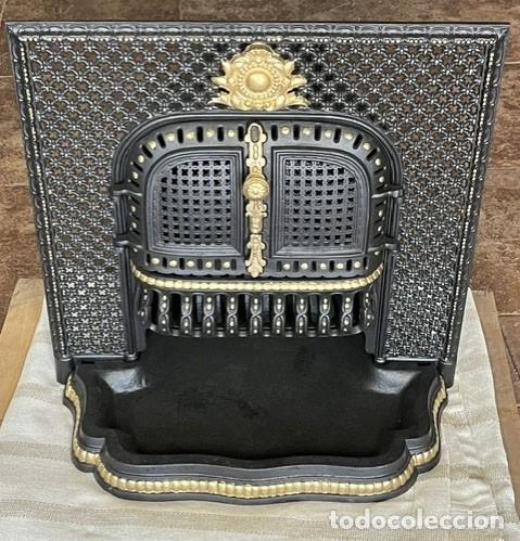 Antig&uuml;edades: Preciosa estufa francesa de hierro fundido