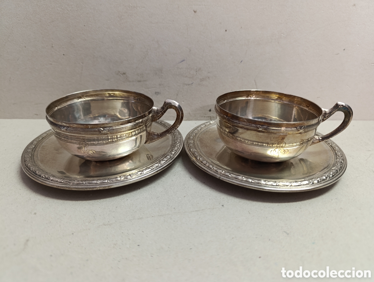 Antig&uuml;edades: PAREJA DE TAZAS EN METAL PLATEADO. DECORACION VEGETAL.