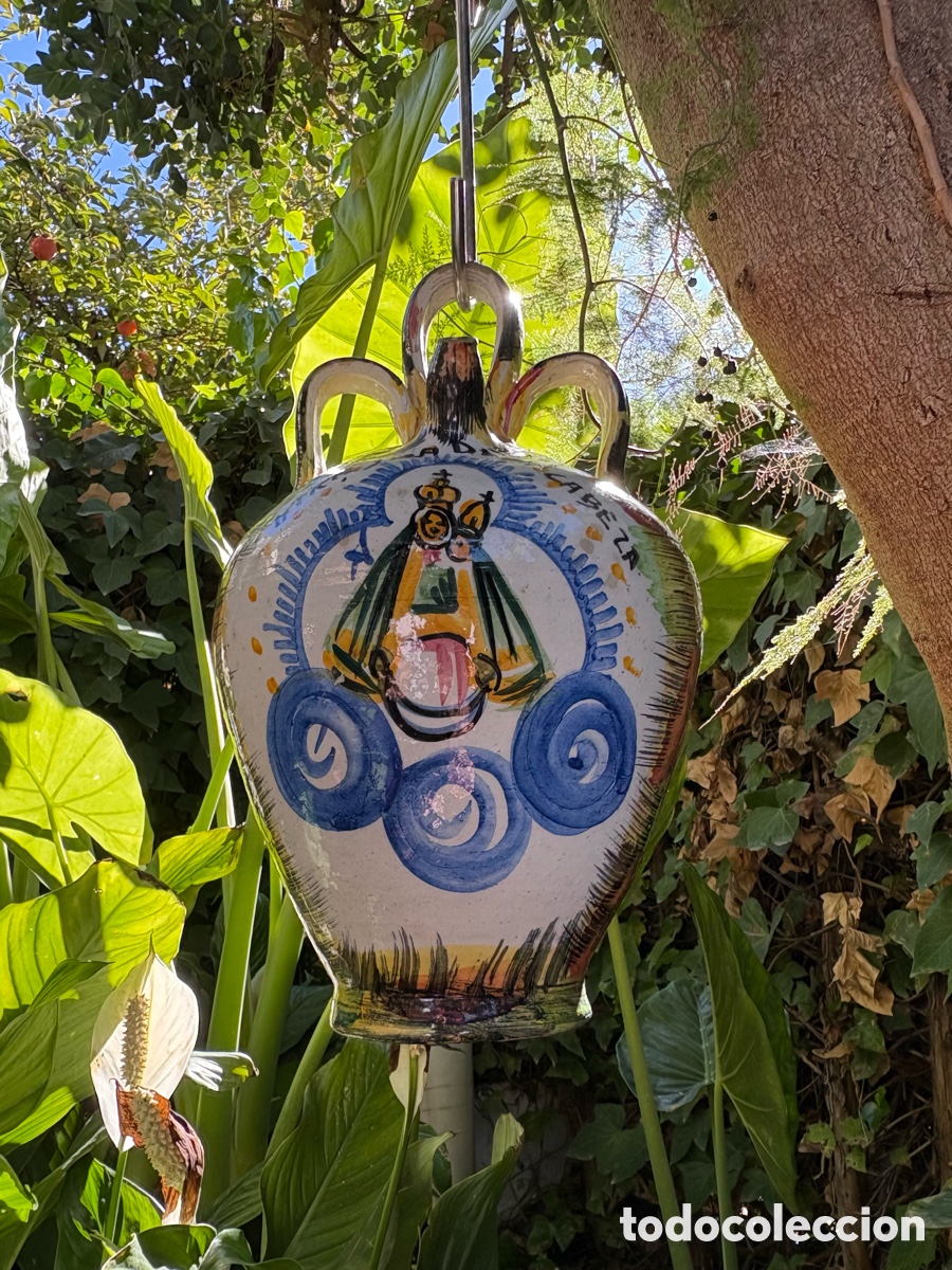 Antig&uuml;edades: BOTIJO RELIGIOSO DE AND&Uacute;JAR.