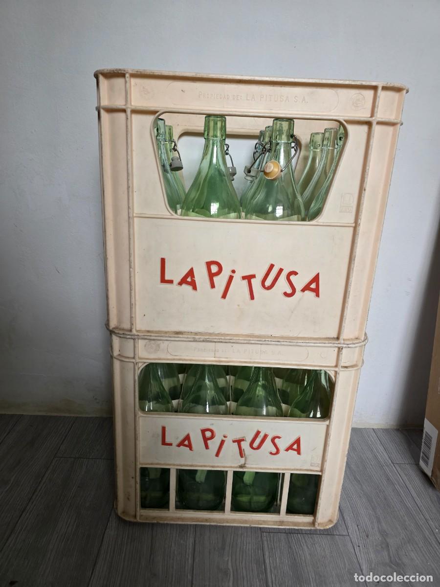 Antig&uuml;edades: Caja La Pitusa + Botellas gaseosa de Cristal