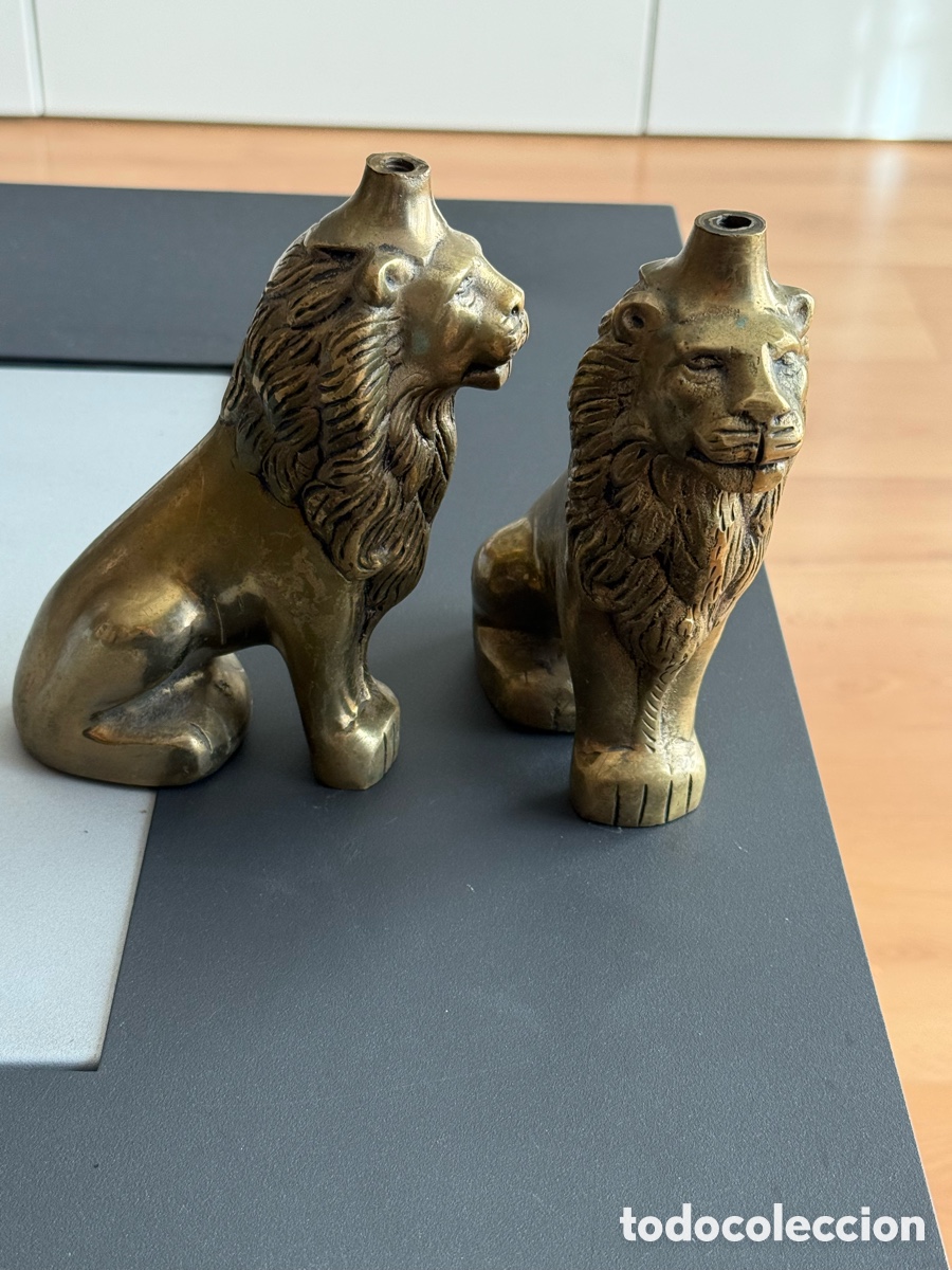 Antig&uuml;edades: PAREJA DE LEONES BRONCE.