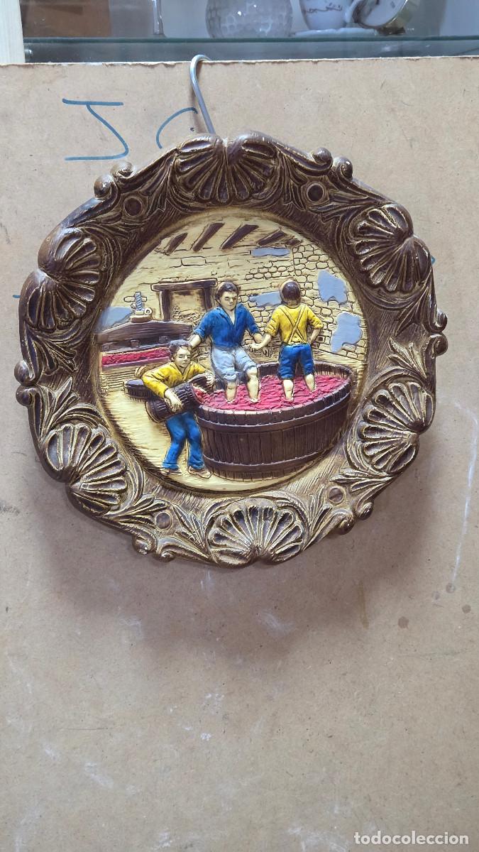 Antig&uuml;edades: palto de prensador e uvas vintage