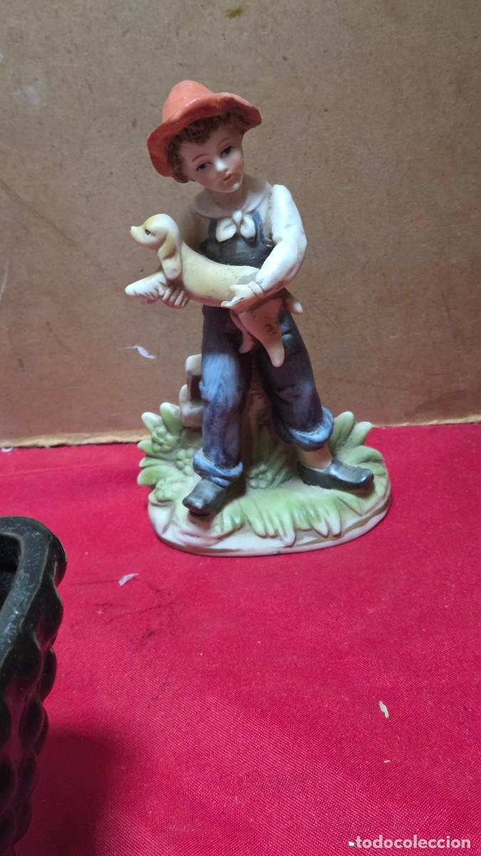 Antig&uuml;edades: figura de porcelana biscuit