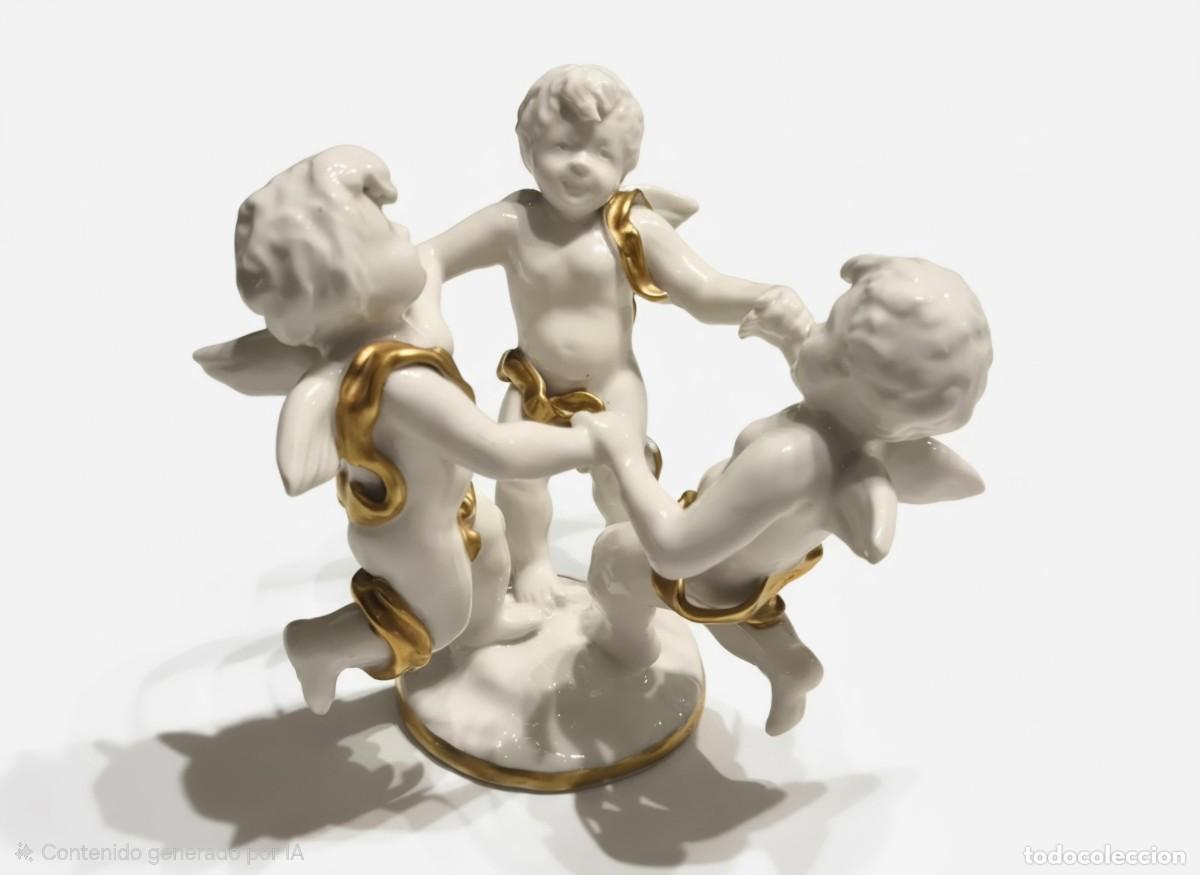 Antig&uuml;edades: ESCULTURA PORCELANA BLANCA TRES QUERUBINES DANZANDO CON PINTURA CON ORO. INTACTO. 1950