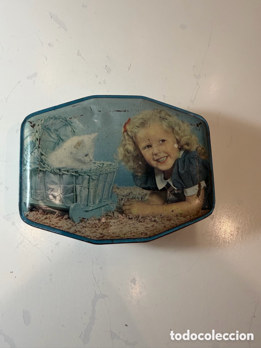 Antig&uuml;edades: Lata antigua Horner ni&ntilde;a con gatito, a&ntilde;os 50