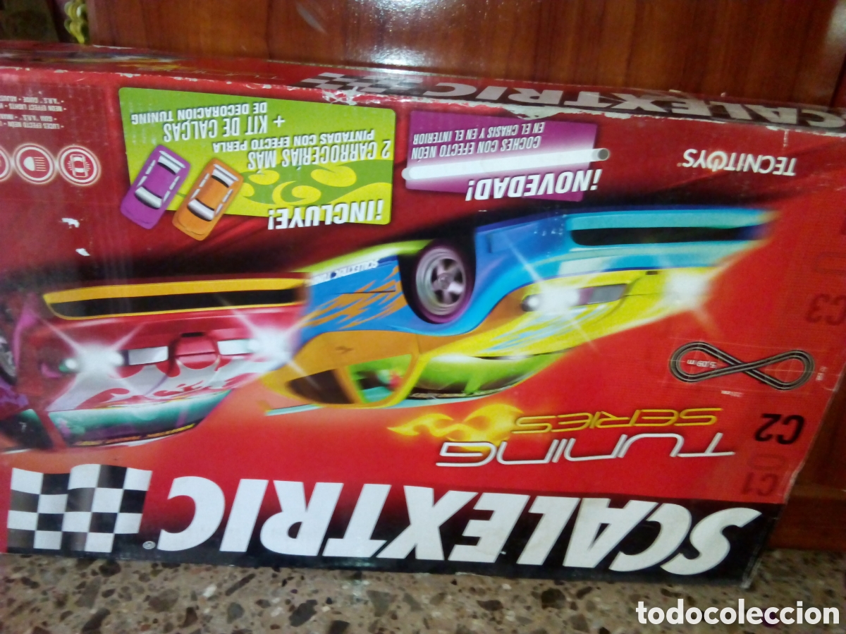 Antig&uuml;edades: Scalextric, libro star Wars precintado, volante play3 y play4, cuna mimbre completa