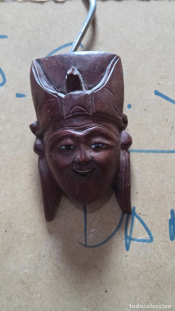 Antiguidades: mascra de arte oriental