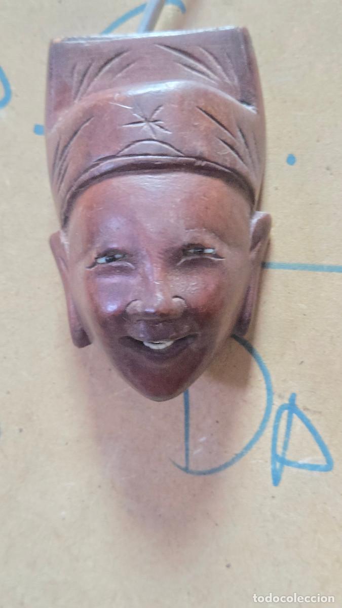 Antiguidades: mascra de arte oriental