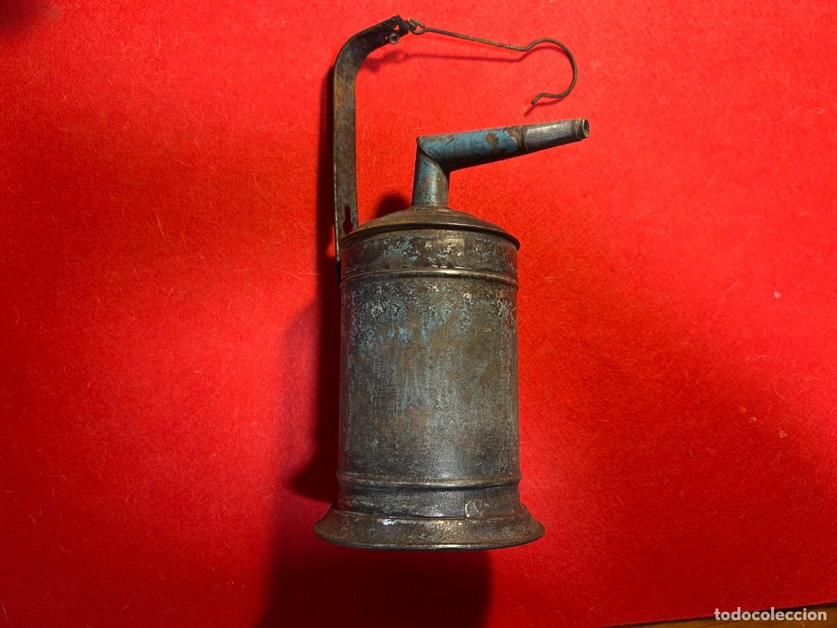 Antig&uuml;edades: lampara de carburo, candil,luz de hierro,antigua