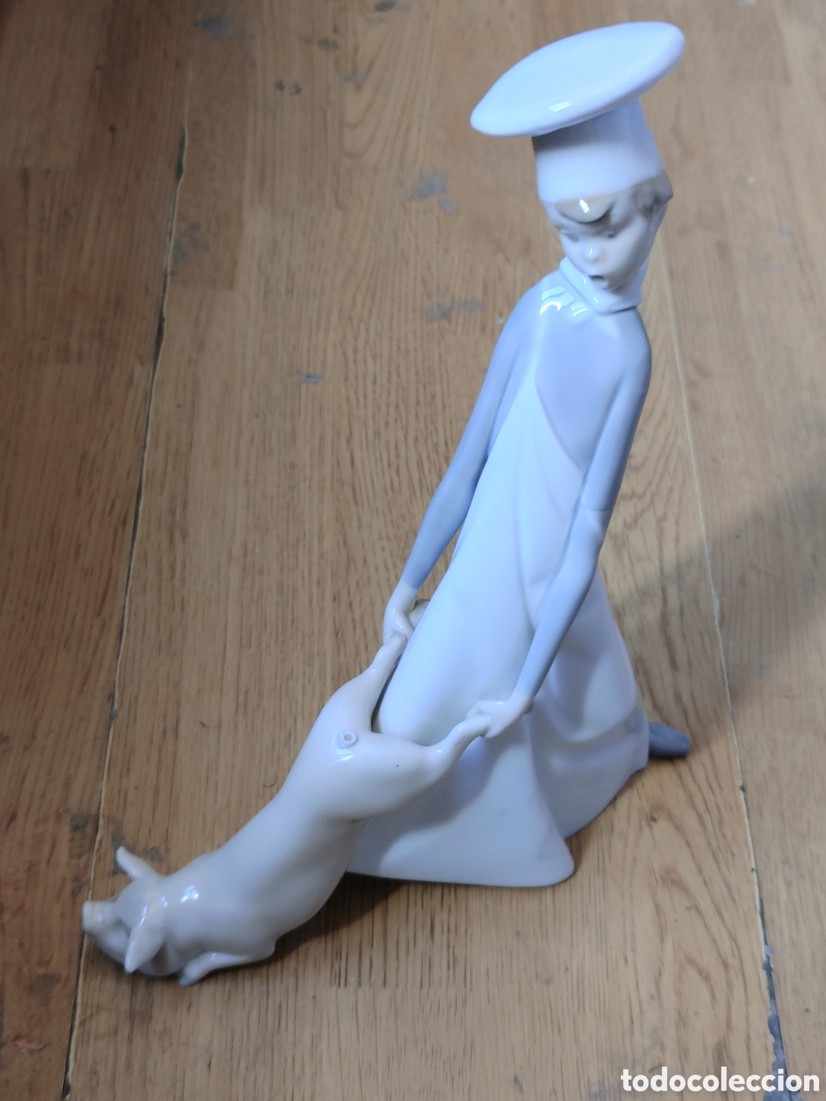 Antig&uuml;edades: Figura en porcelana de Lladro. Cocinero en apuros.