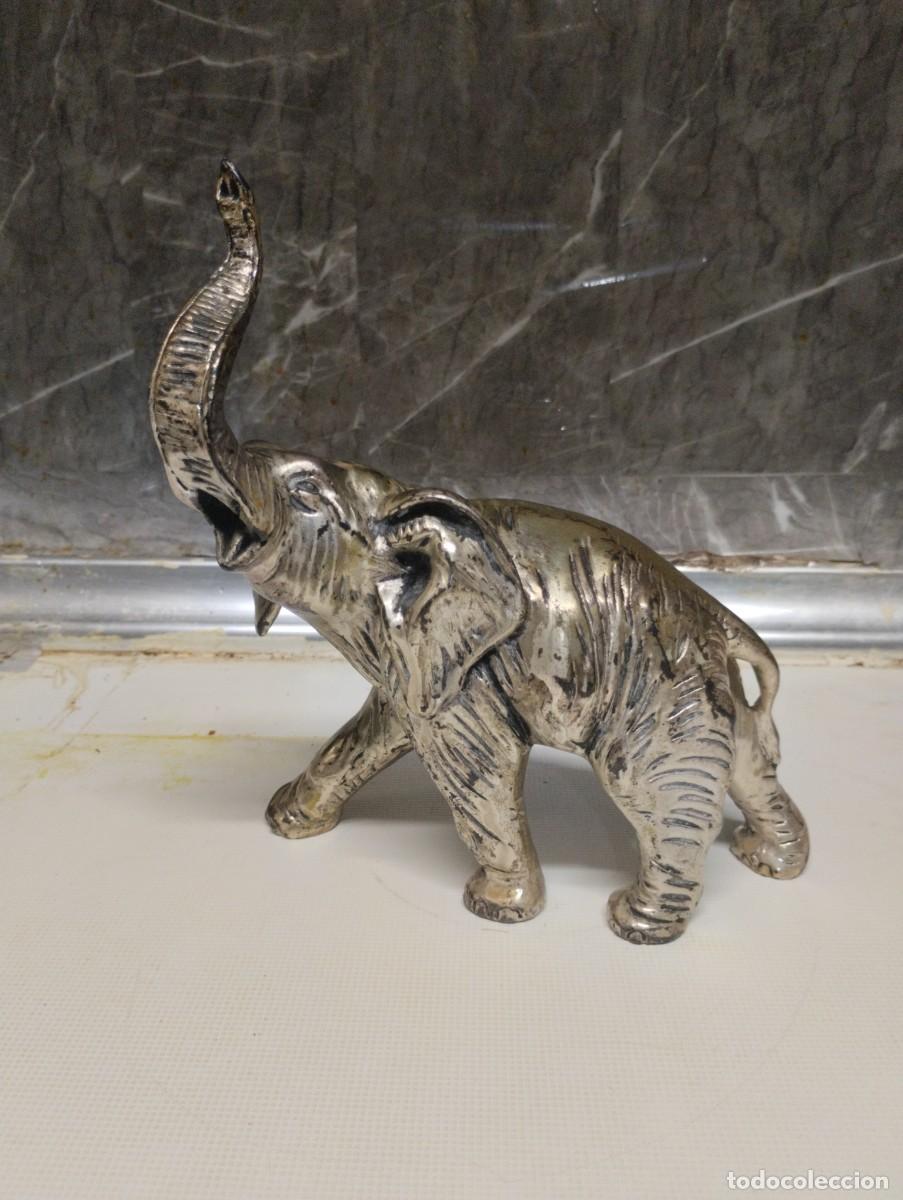 Antig&uuml;edades: Escultura de elefante ba&ntilde;ada en plata de ley