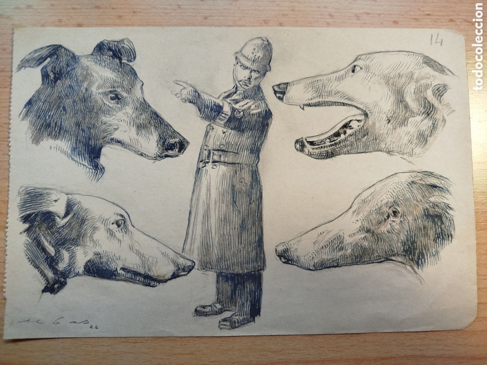 Art: Federico Ribas. Cabezas de perros y un polic&iacute;a.