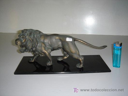 Arte: escultura de leon - Foto 1