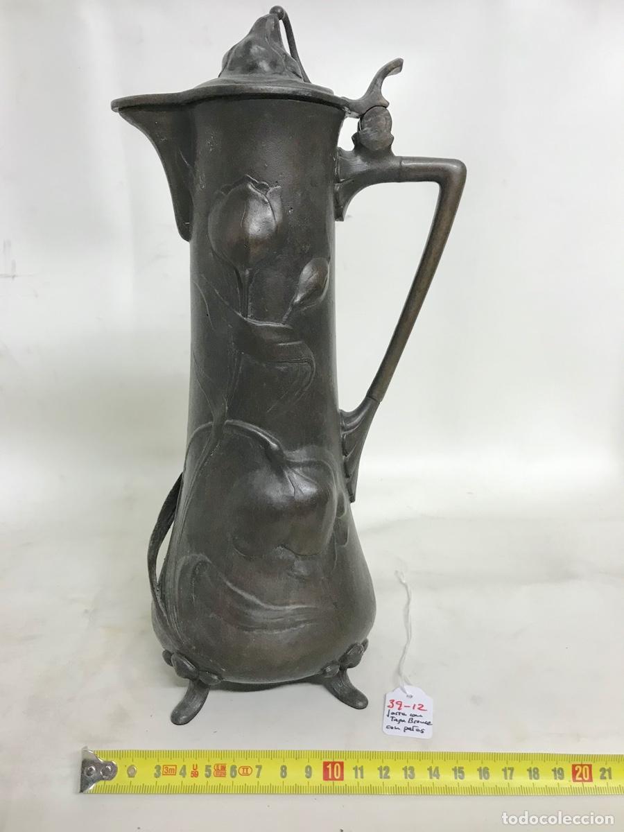 Arte: Jarra de bronce con asa y tapa. - Foto 1