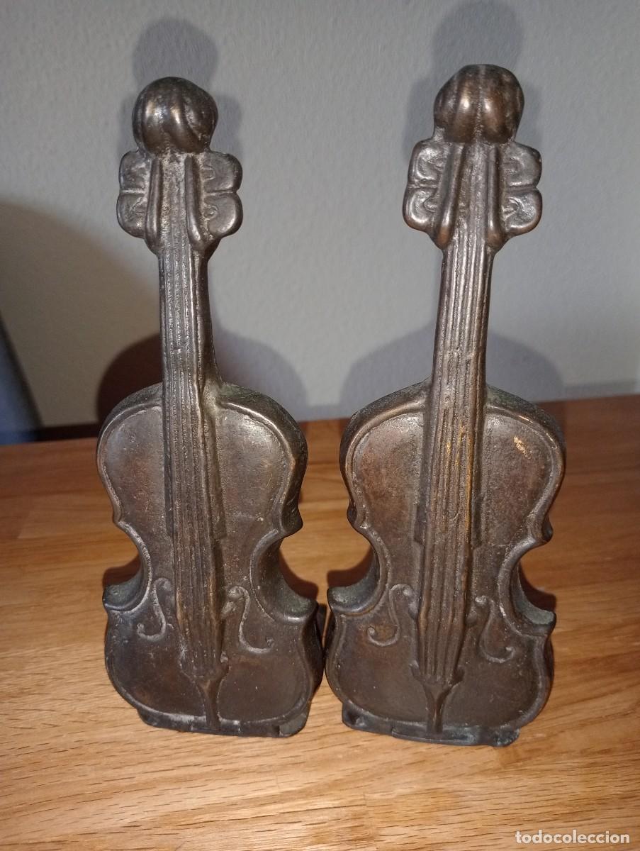 Arte: Sujeta libros forma violin - Foto 1