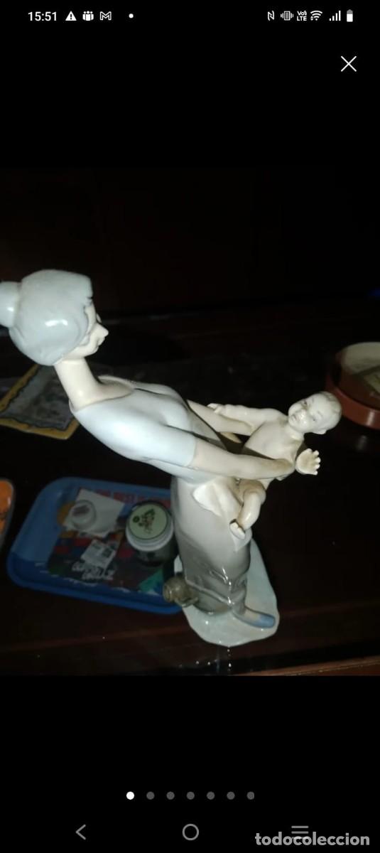 Arte: Mujer abrazando a ni&ntilde;o - Foto 2