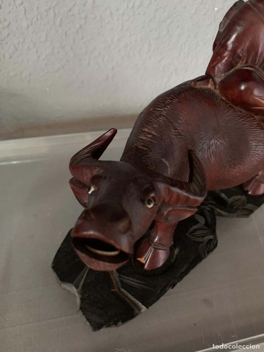 Arte: buey tallado con ni&ntilde;o y base - Foto 3