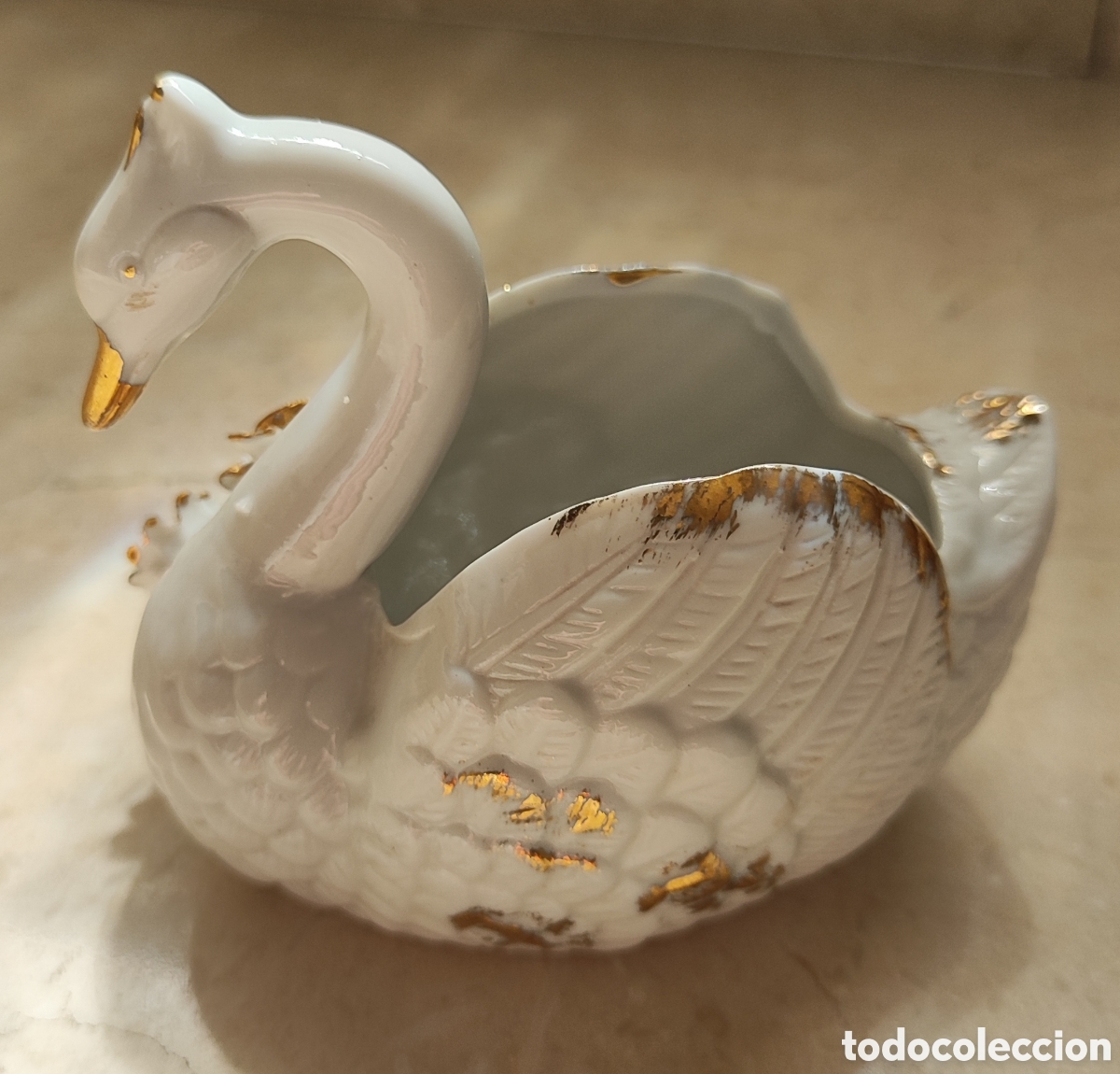 Arte: Figura de porcelana de un cisne