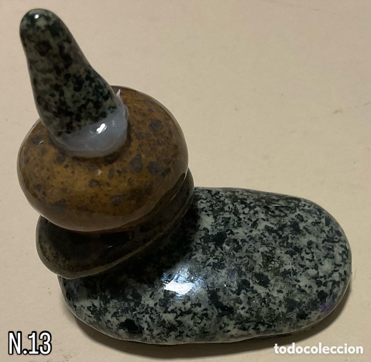 Art: N&uacute;mero 13. Escultura de piedra.