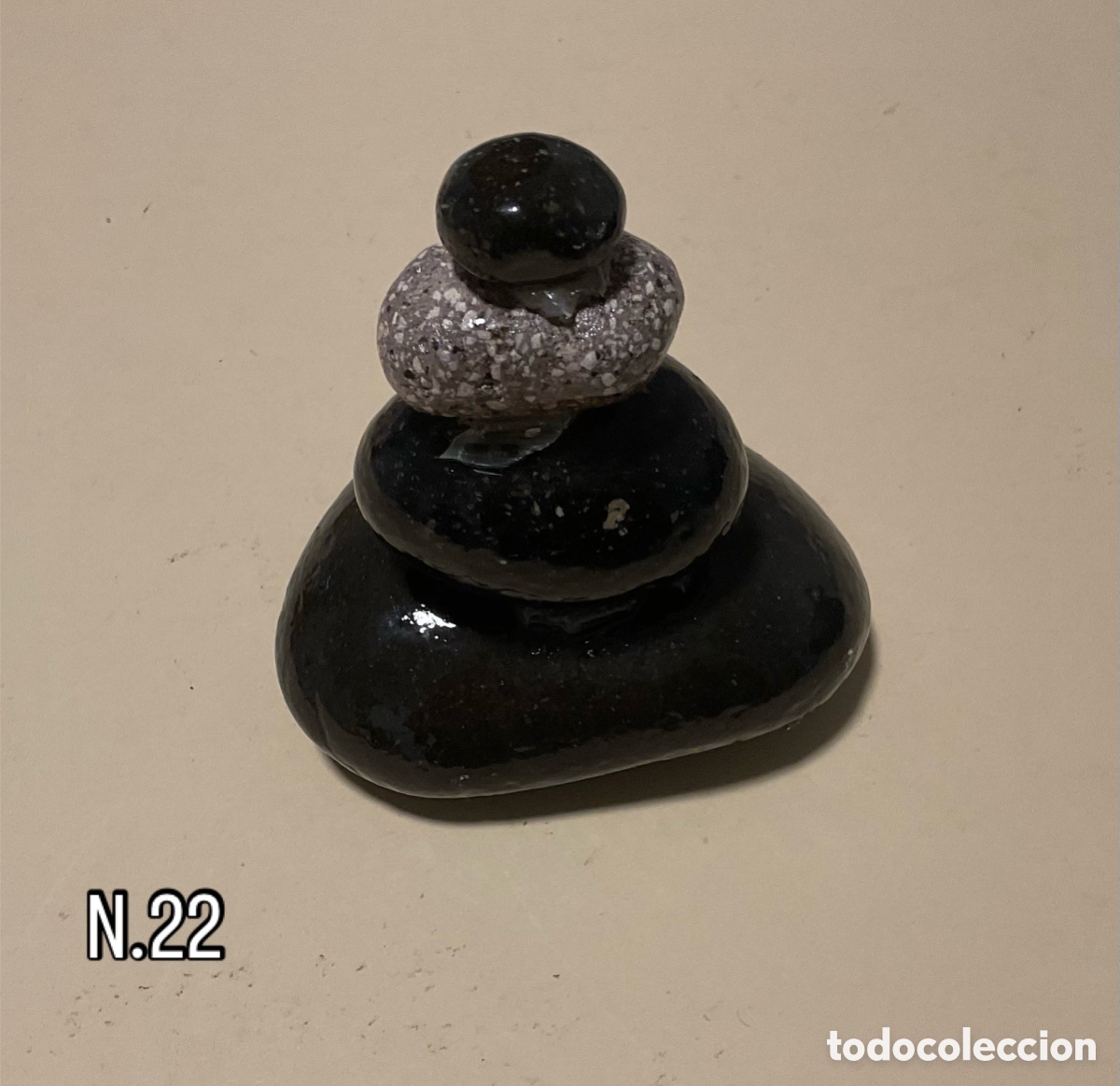 Art: N&uacute;mero 22. Escultura de piedra.