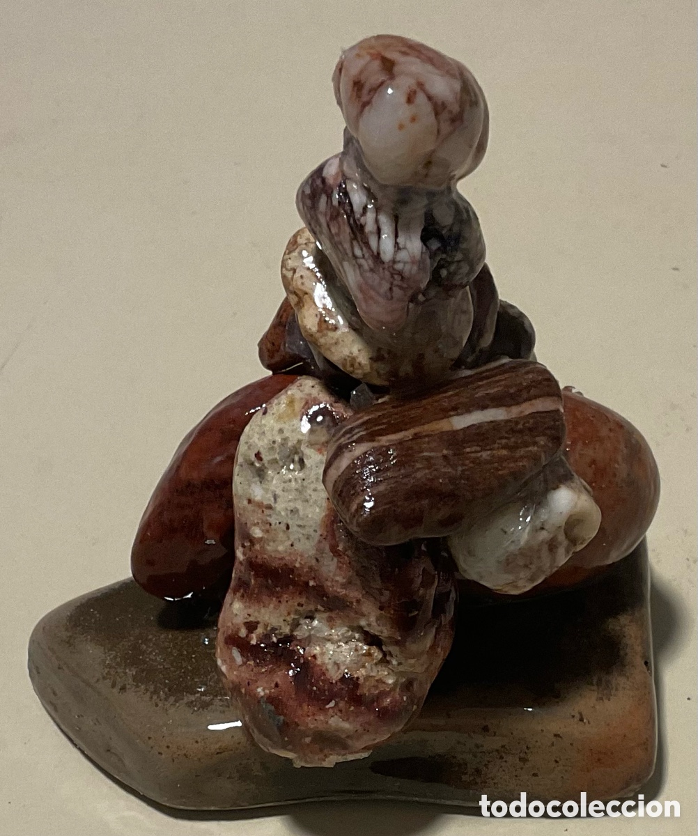 Art: N&uacute;mero 17. Escultura de piedra.