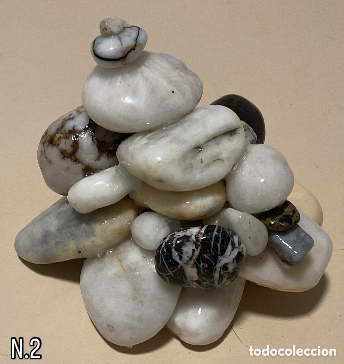 Art: N&uacute;mero 2. Escultura de piedra.