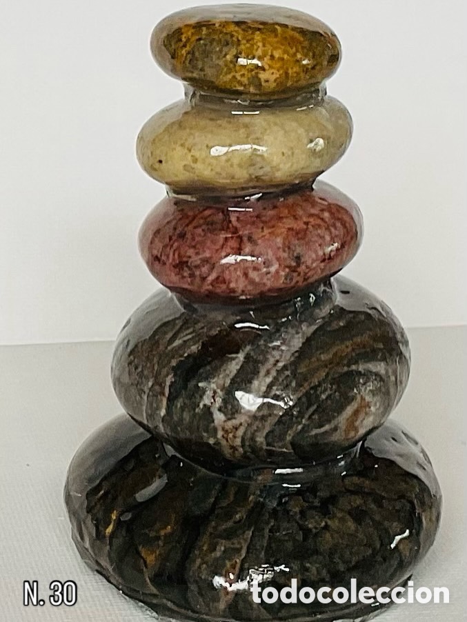 Art: N&uacute;mero 30. Escultura de piedra.