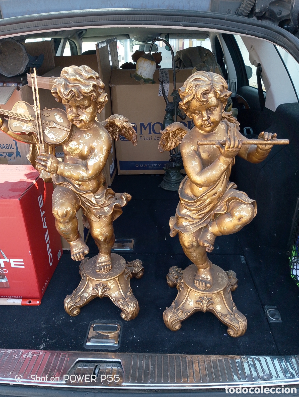 Arte: Querubines m&uacute;sicos dorados