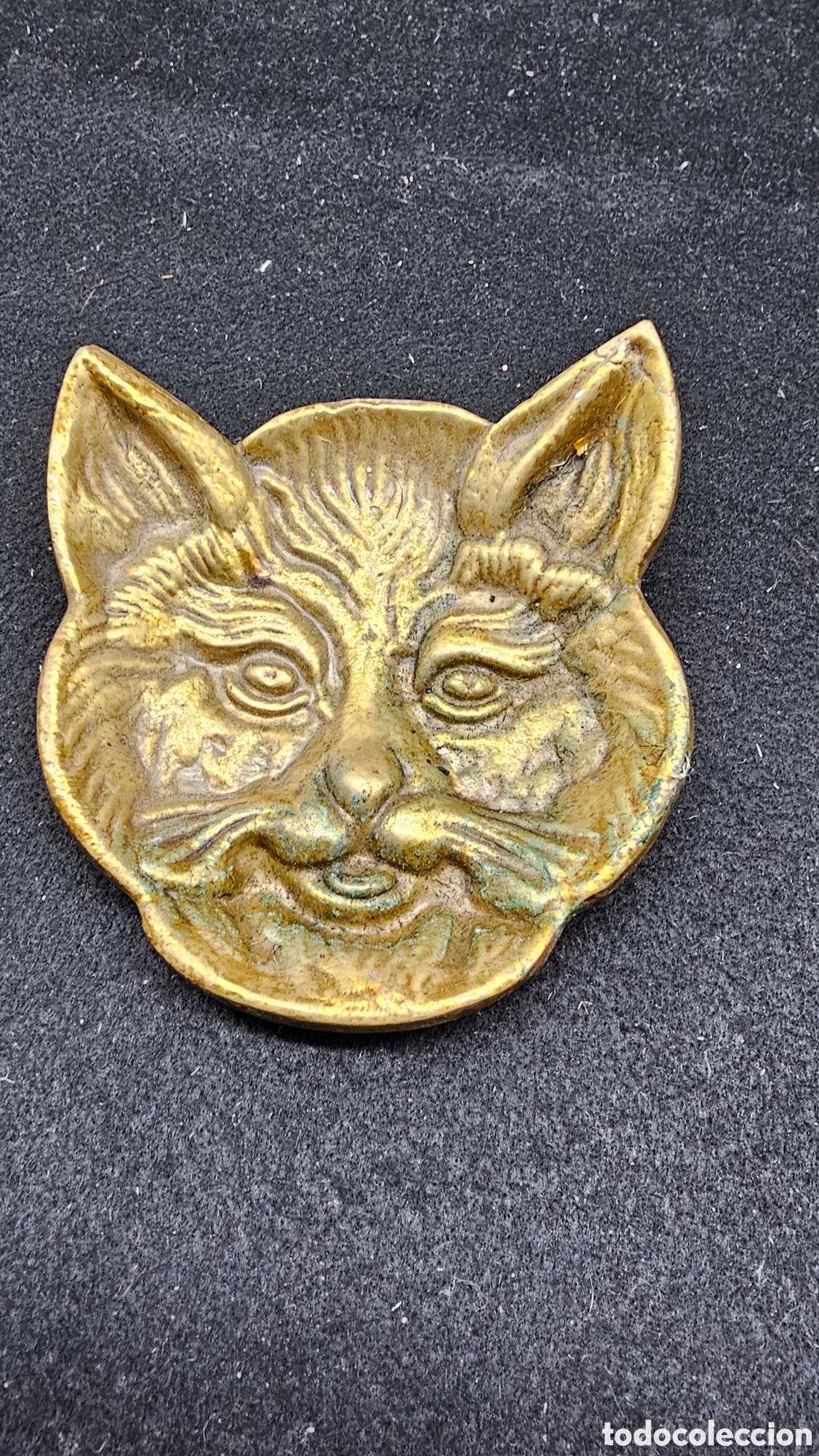 Arte: Vaciabolsillos de bronce fundido