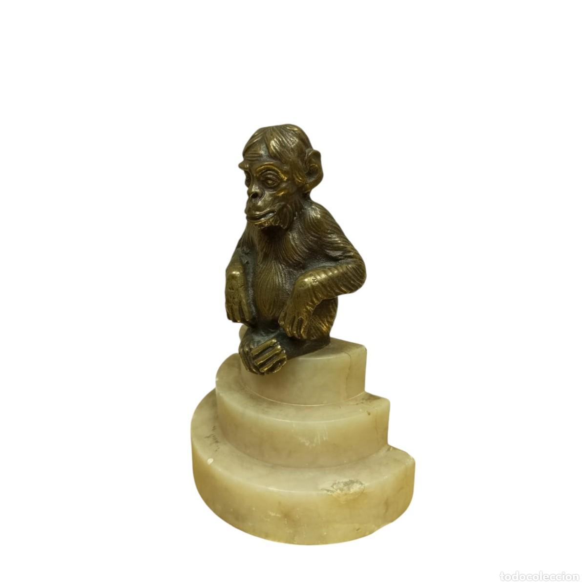 Arte: BRONCE VIENES MONO SUJETA LIBROS