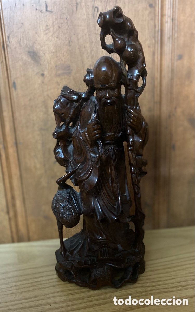 Arte: Monge Asi&aacute;tico de madera africana