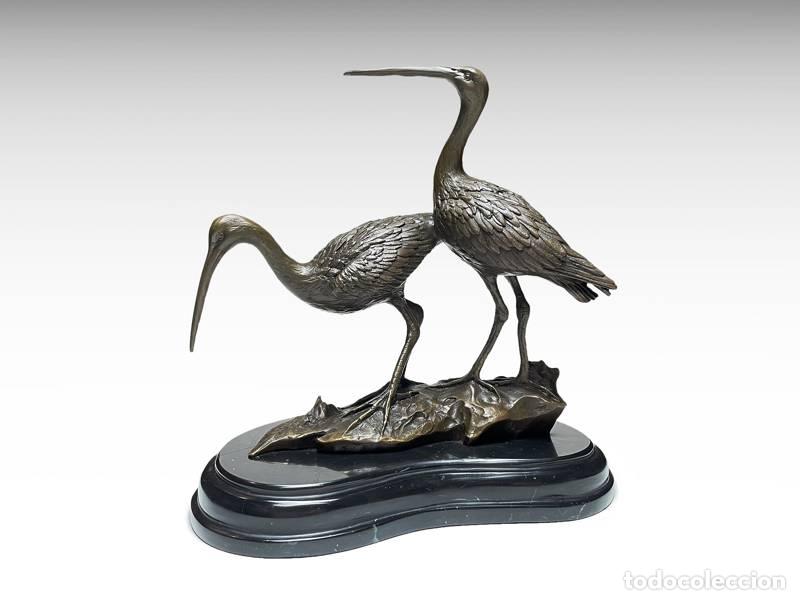 Arte: Escultura de bronze - Gar&ccedil;as (1163)