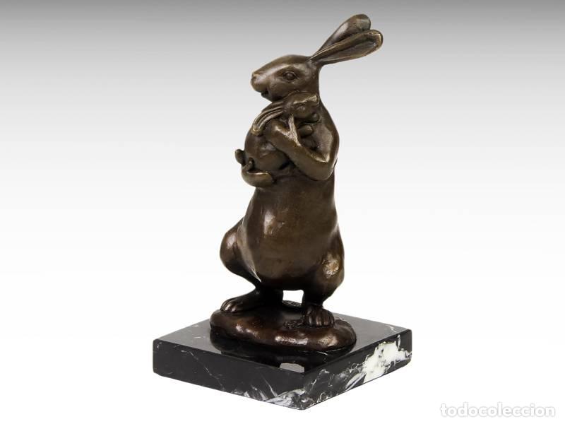 Arte: Escultura de bronze - Coelhos (1054)