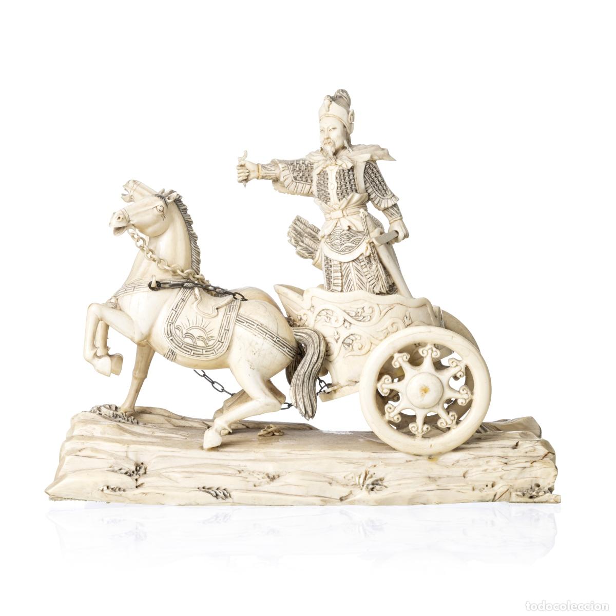 Arte: Grupo escult&oacute;rico Carga con guerrero