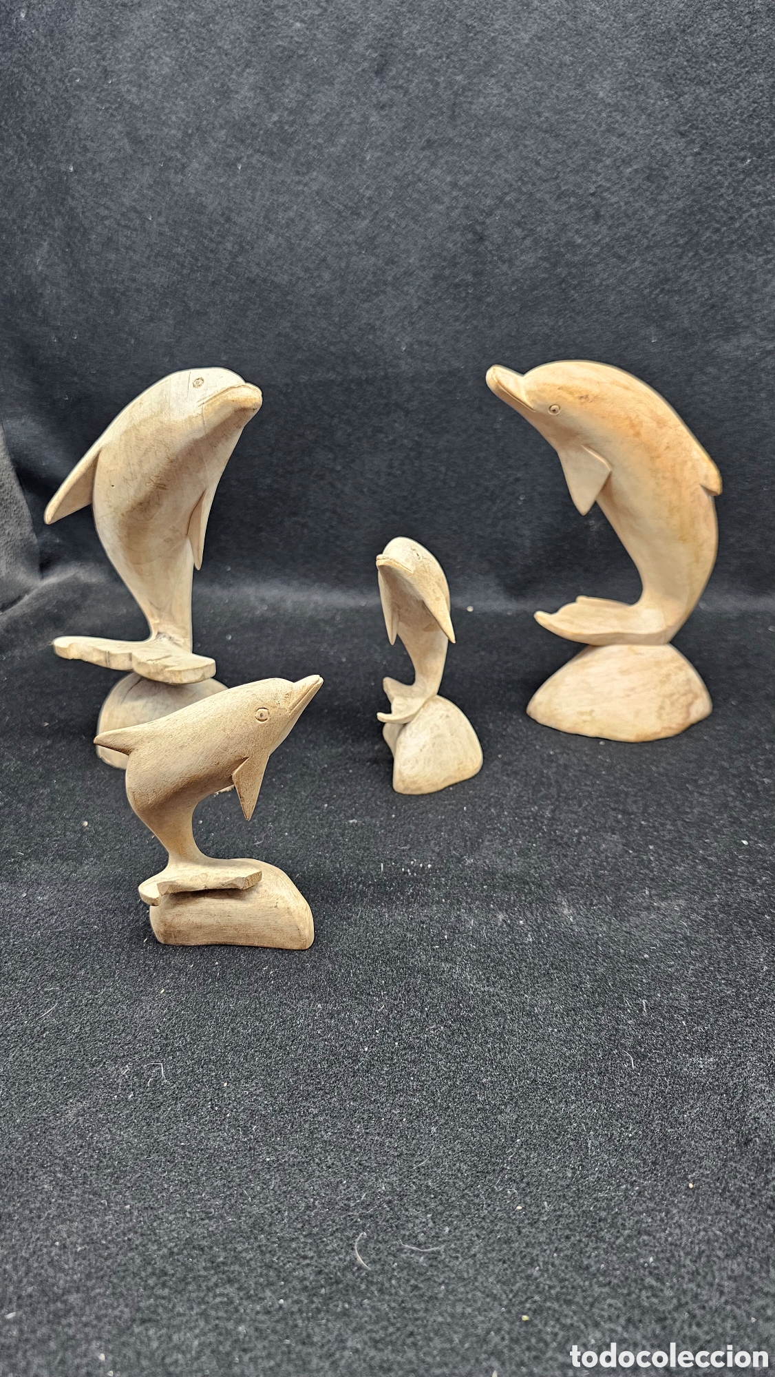 Arte: Lote de delfines de madera