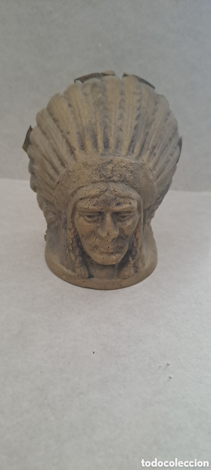 Arte: Cabeza indio de bronce